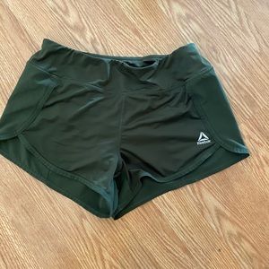 Army green Reebok shorts